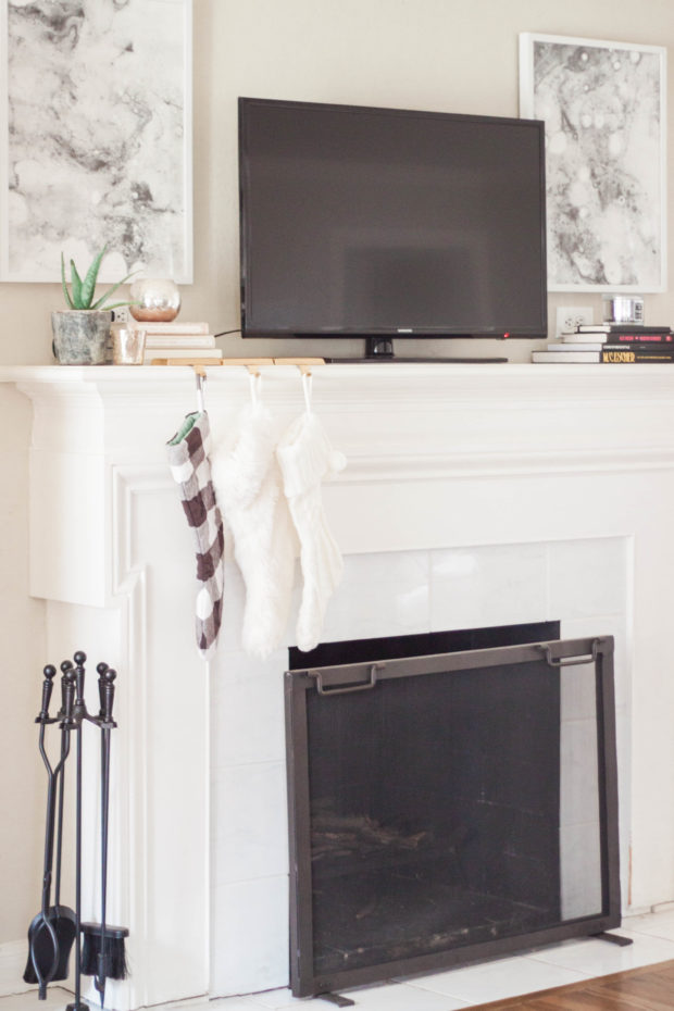 Neutral + metallic mantle decor with Minted as seen on b is for bonnie design | Monochromatic Christmas decor makes for an easy way to decorate around your TV